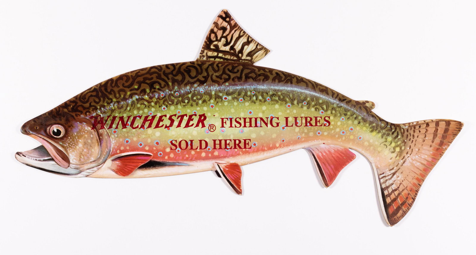 WINCHESTER FISHING LURES DIE CUT ADVERTISEMENT: Winchester die cut advertising sign reading 'Winchester Fishing Lures Sold Here', a multi-colored image of a trout. Printed on cardboard. Very light wear at some edges. 7 x 16.5 inches. Very fine.
