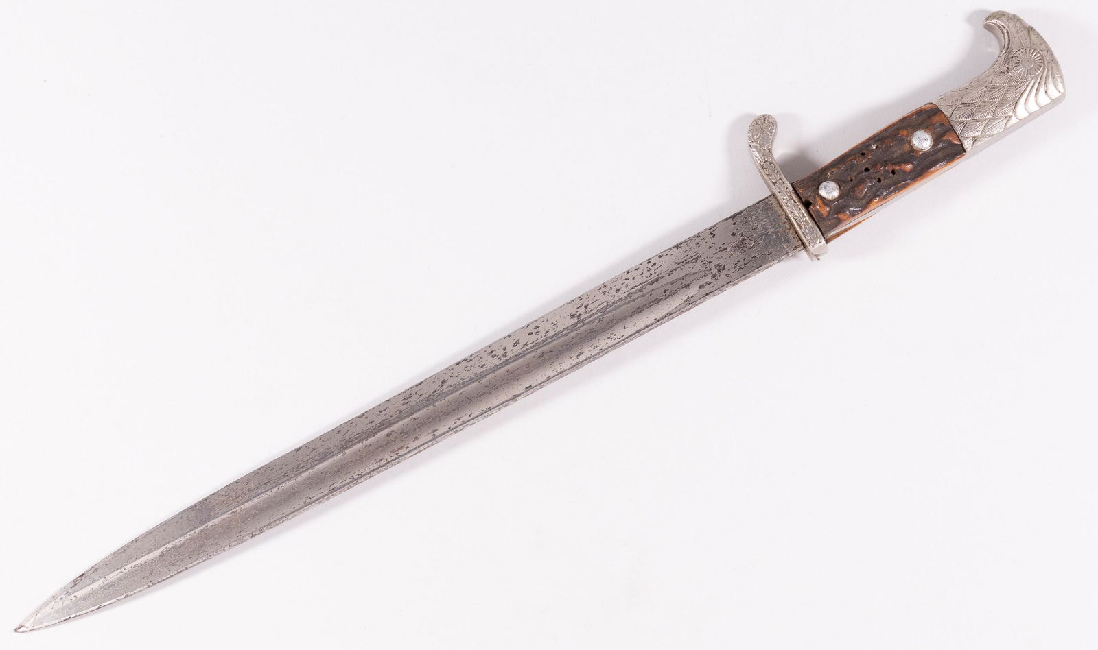 GERMAN WWI DRESS DAGGER BY WEYERSBERG: German WWI dress dagger. Intricate eagle design on pommel, stag grips, wreath design on cross guard. Blade marked 'Weyersberg, Kirschbaum and Cie., Solingen', cross guard is marked S.R. 672. Markings