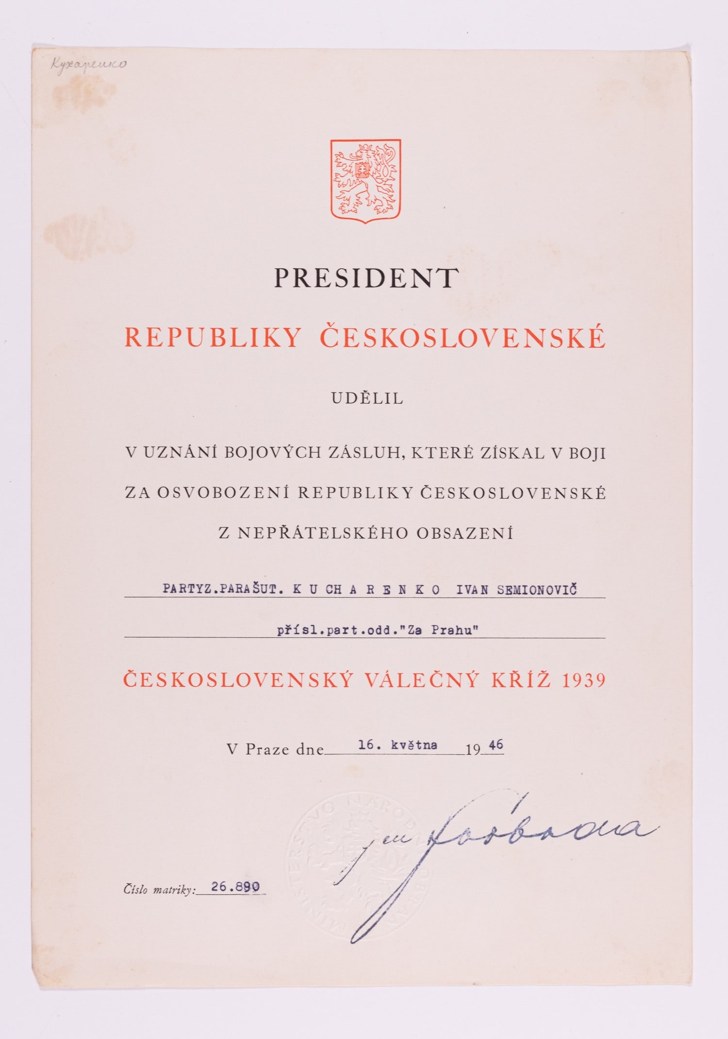 CZECH WWII AWARD TO PARATROOPER PARTISAN FIGHTER: Award of the Czechoslovak War Cross 1939 to paratrooper Ivan Kucharencho of the 'For Prague' partisan unit, issued in Prague, May 16, 1946. Stamped signature of Ludvik Svoboda. Possibly an NKVD member