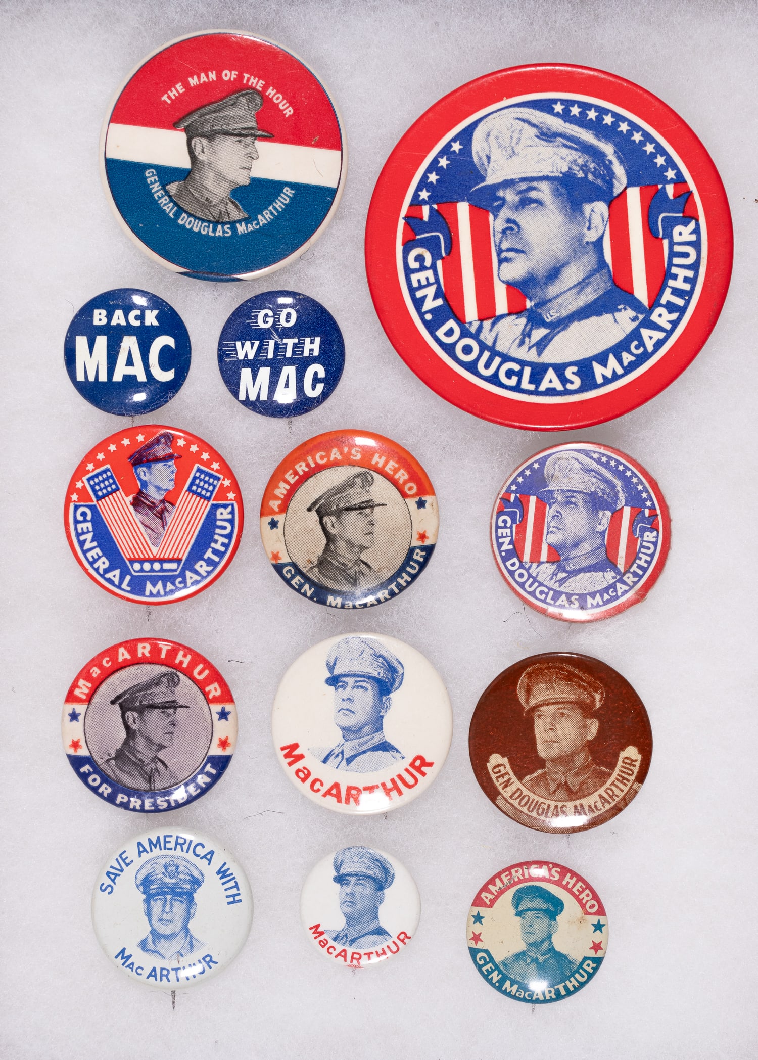 13 DOUGLAS MACARTHUR BUTTONS: Thirteen political buttons for General Douglas MacArthur from his 1948 Republican presidential campaign. MacArthur decided to run for president on the basis of his reputation as a war hero and the ove