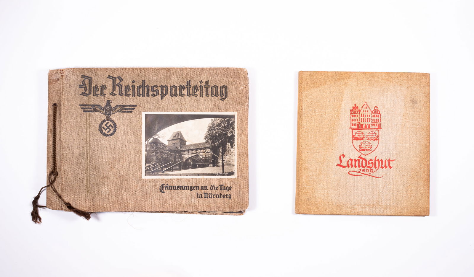 WWII GERMAN REICHS PARTY DAY PHOTO ALBUM: Blank WWII photo album with the cover 'Der Reichsparteitag' (The Nazi Party Congress) with a photograph by Heinrich Hoffman (1885-1957). The caption under the photograph reads 'Erinnerungen an die Tag