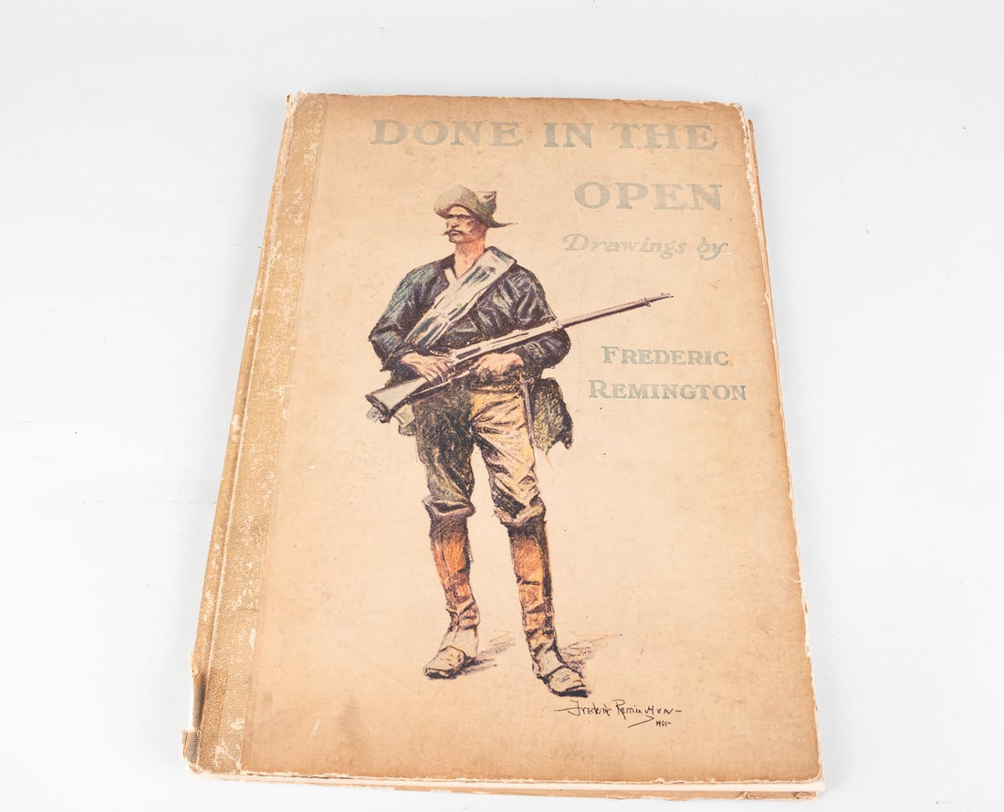 DONE IN THE OPEN BY FREDERIC REMINGTON: 'Done in the Open' by Frederic Remington (1851-1909). The book features Western artwork by Remington. Published by P.F. Collier & Son Publishers, 1903. Clothbound, some pages are loose from binding. 1