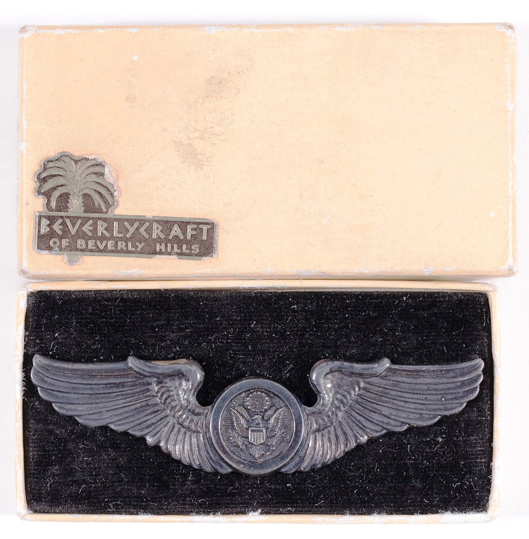 WWII US AIR FORCE AIRCREW BADGE STERLING: WWII sterling silver U.S. Air Force Aircrew wings, marked 'Sterling' on the backside, in original box from 'Beverly Craft of Beverly Hills' jewelers. Wings approx. 3 1/8 inches wide.