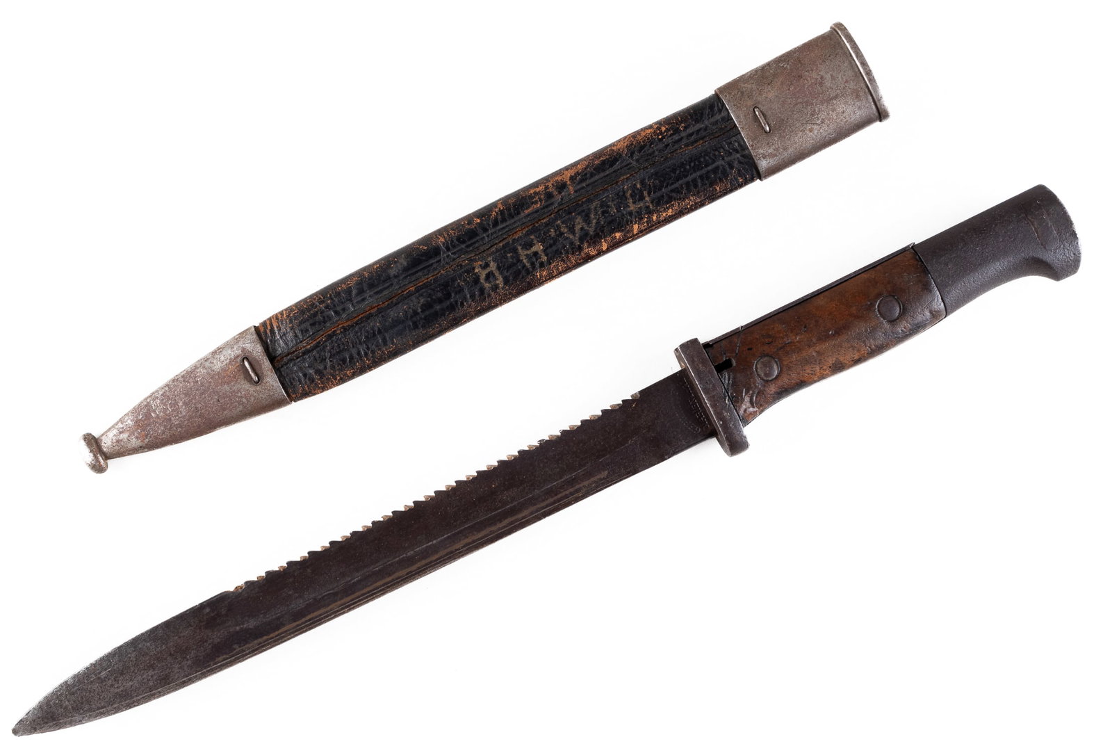 WWI GERMAN SAWBACK BAYONET W/ SCABBARD: WWI German sawback M1884/98 bayonet. The bayonet features a wooden grip with a metal pommel, cross guard, and blade. The blade is marked 'Gebr. Heller, Marienthal'. Included is an unmarked leather and