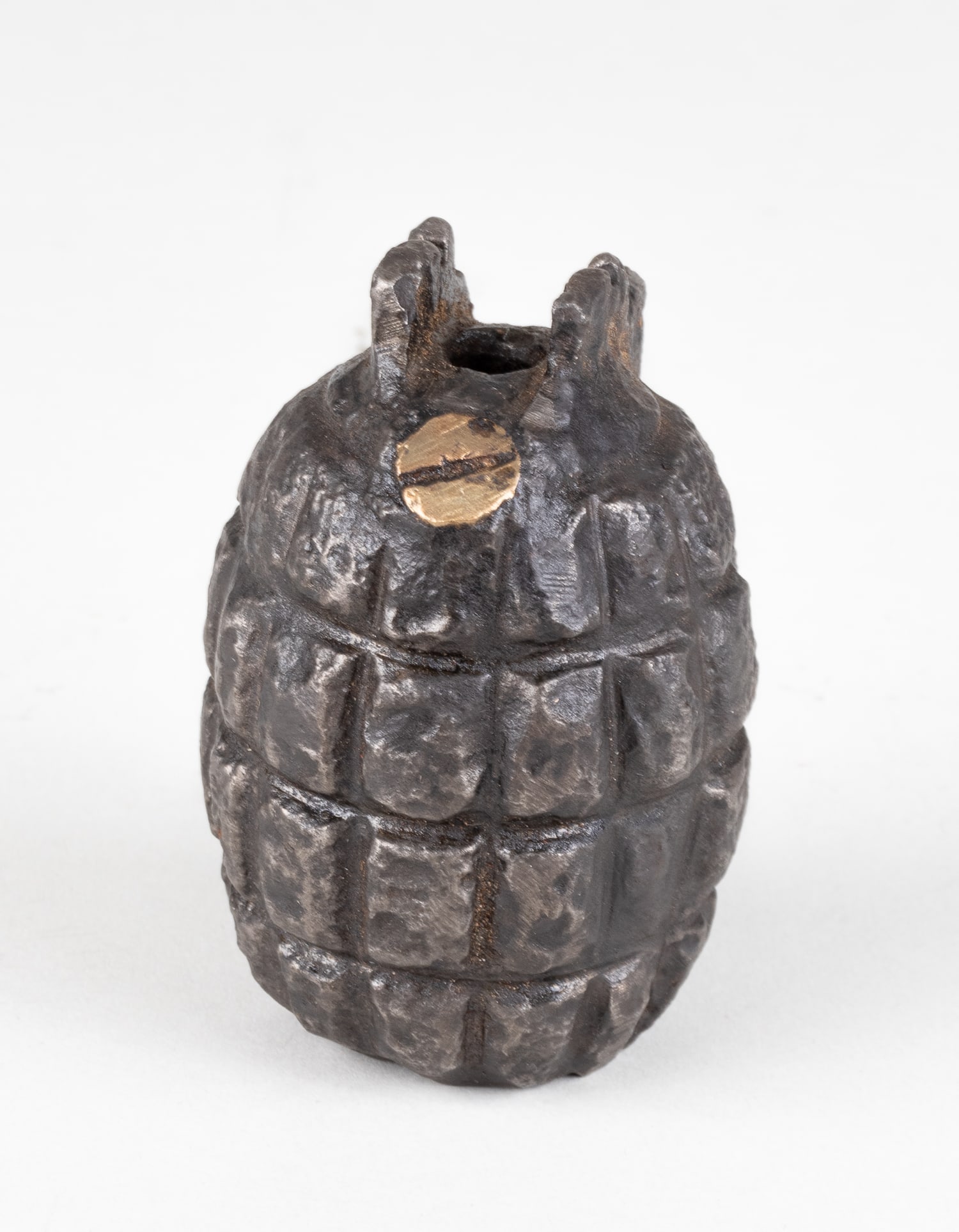 WWI & WWII BRITISH MILLS BOMB GRENADE: Inert early WWI British Mills Bomb fragmentation grenade recovered in Ypres, Belgium. They were the first modern fragmentation grenades used by the British Army and saw widespread use in the First and