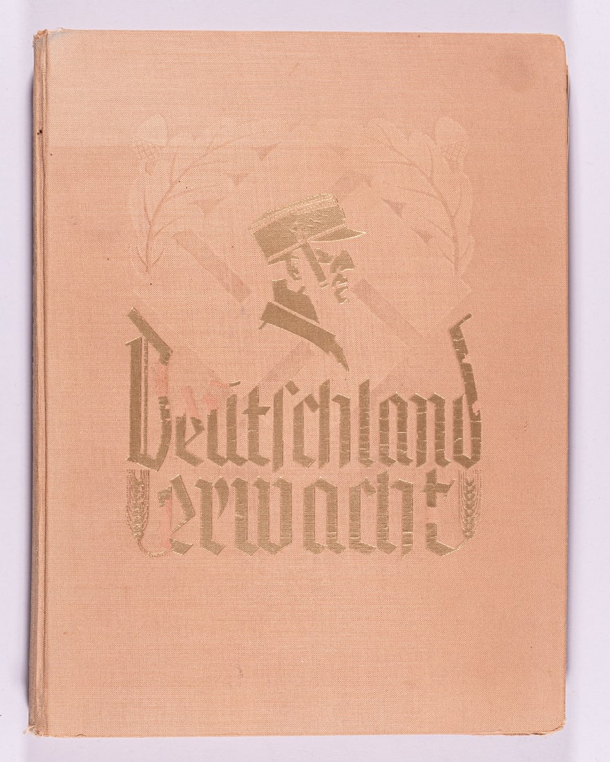 DEUTSCHLAND ERWACHT CIGARETTE CARD ALBUM: WWII German cigarette card album DEUTSCHLAND ERWACHT (Germany Awakes), published by the NSDAP, Heinrich Hoffmann, Cigaretten-Bilderdienst, Hamburg, cloth-covered hardback, approx. 160 pages, 12.5 x 9.
