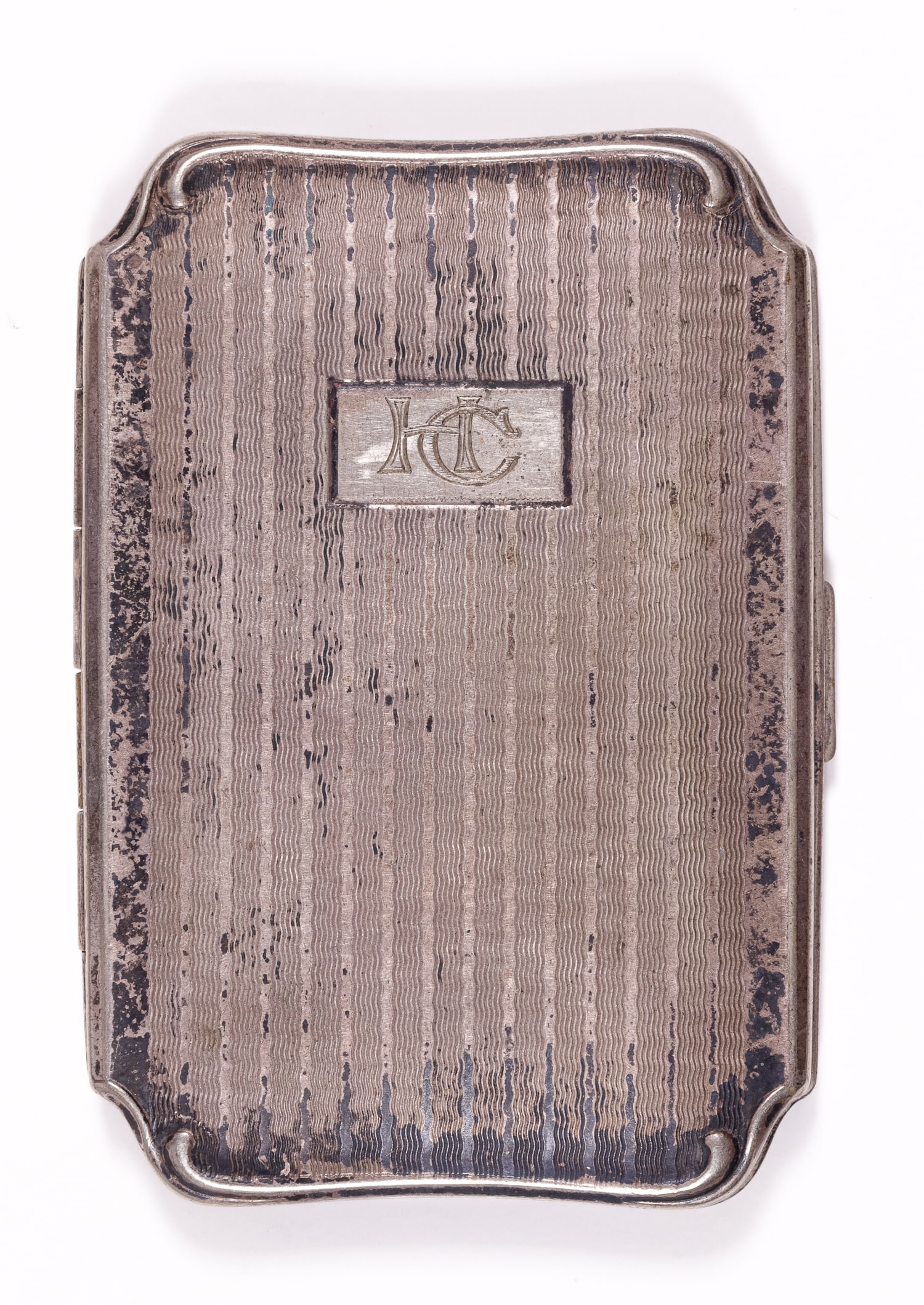 WWII GERMAN CIGARETTE CASE: WWII German cigarette case, the inside of the case is inscribed 'Weihnachten 1939' (Christmas 1939). 2.25 x 3.25 inches.