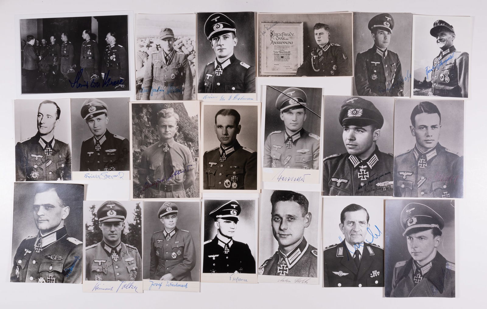 20 GERMAN ARMY KNIGHTS CROSS RECIPIENTS: Lot of twenty Wehrmacht Knight's Cross recipients' photos. Including signatures from ERICH WEYEL, HANS JOACHIM HEINRICI (signed twice), ADOLF VOGT, HORST RUDAT, ANTON STOLTE, ARTHUR TIEFENSEE, JOSEF W