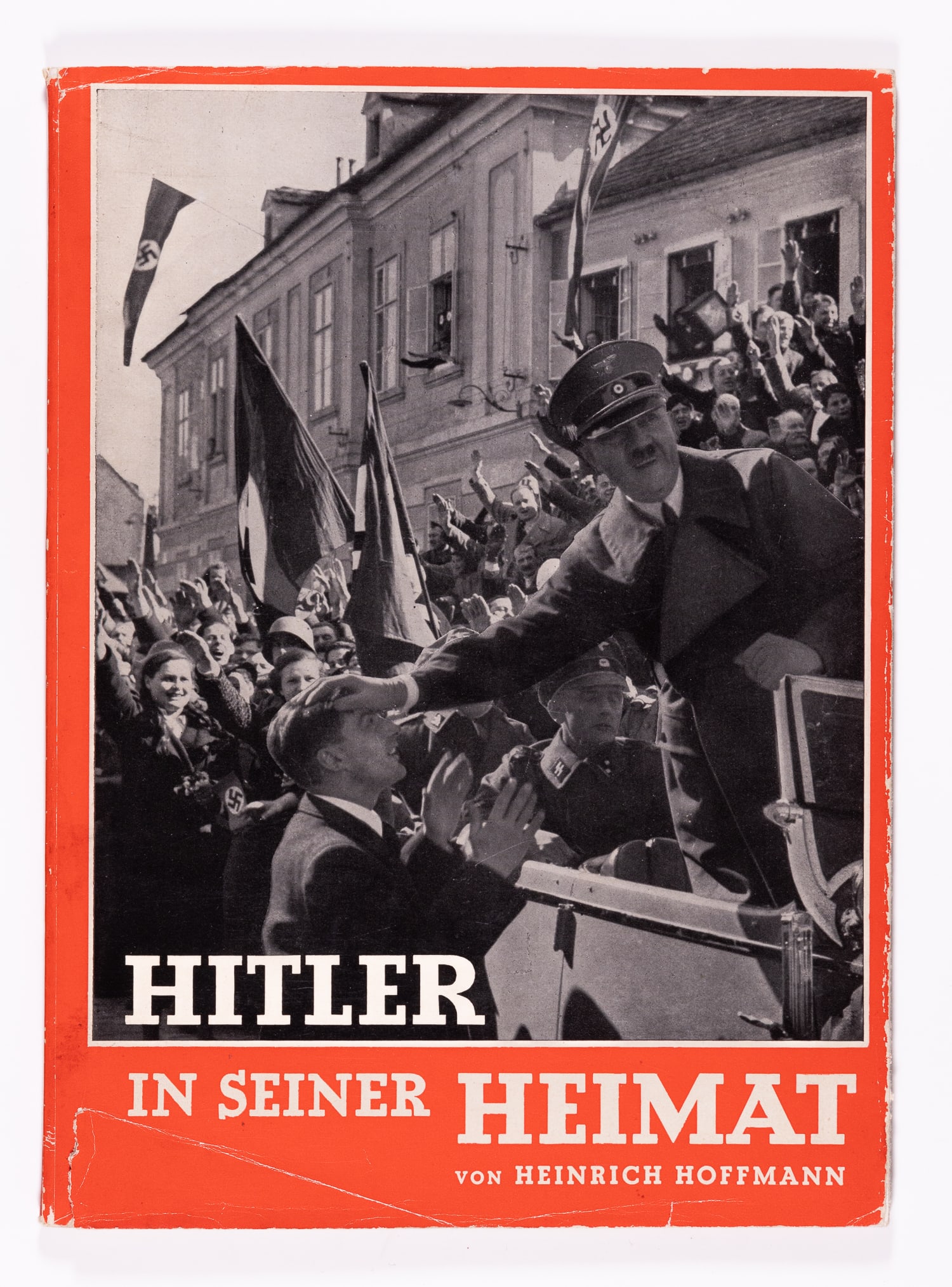 HITLER IN HIS HOMELAND / HITLER IN SEINER HEIMAT: Hitler in his Homeland 'Hitler in seiner Heimat.' Foreword by Dr. Otto Dietrich, Reichs Press Chief. 1938/42, edited and published by Heinrich Hoffmann, Munchen. Berlin. Original dust jacket, wear and