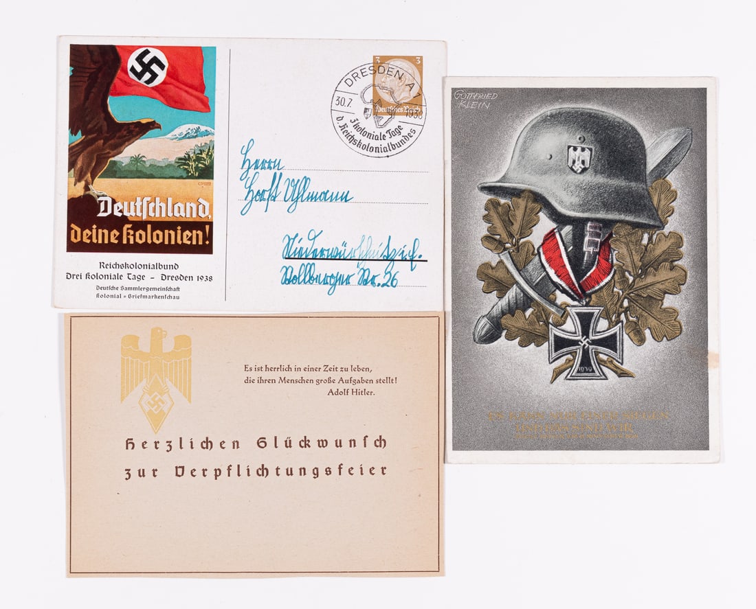 3 NAZI PROPAGANDA POSTCARDS: It features 2 not postal used postcards and one postal used postcard. 1. Gottfried Klein postcard of Nazi helmet, oak leaves, and the Iron cross with the date 1939. The reverse side has a place for a 