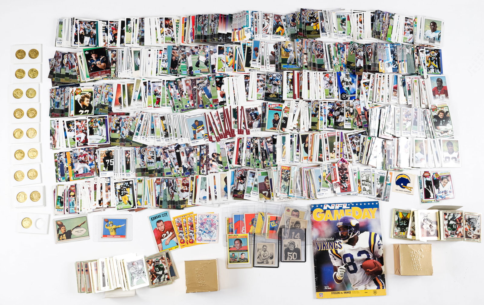 1,000 FOOTBALL CARDS: Approximately 1,000 football from mixed brands including Upper Deck and Topps. WITH: NFL Gameday magazine dated December 20, 1992, and NFL quarterback club coins.