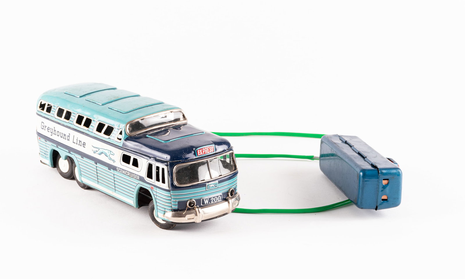 GREYHOUND BUS SCENICRUISER - LINE MAR TOYS JAPAN: Greyhound line bus 'Scenicruiser' by Line Mar Toys, Japan. Battery operated wired remote, clean, missing steering wheel.