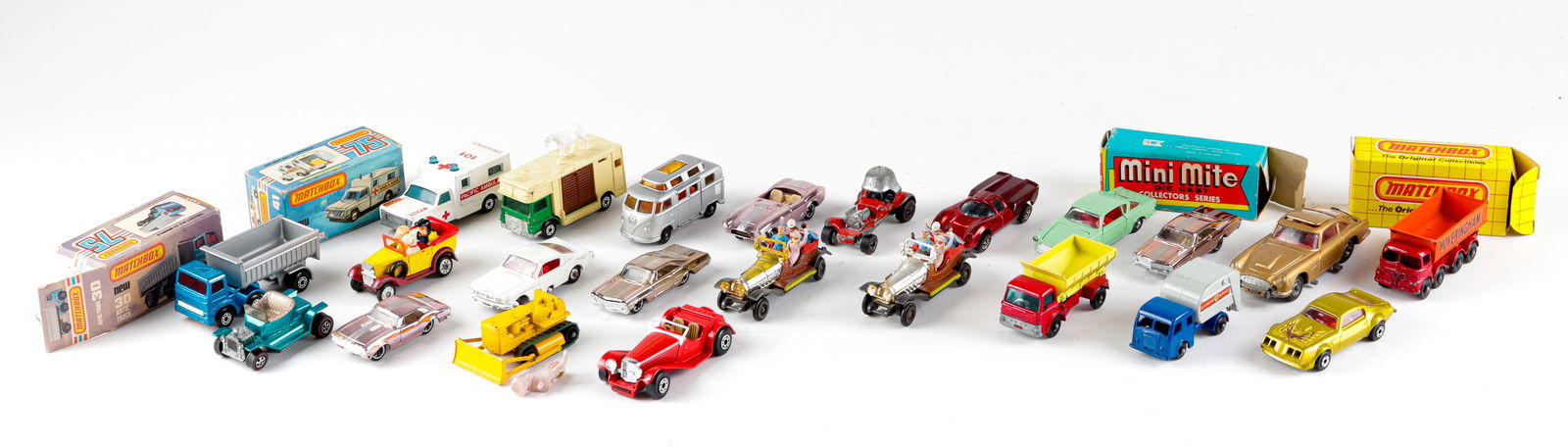 23 VINTAGE MATCHBOX CARS: 23 assorted vintage Matchbox cars, used, some with the original box.