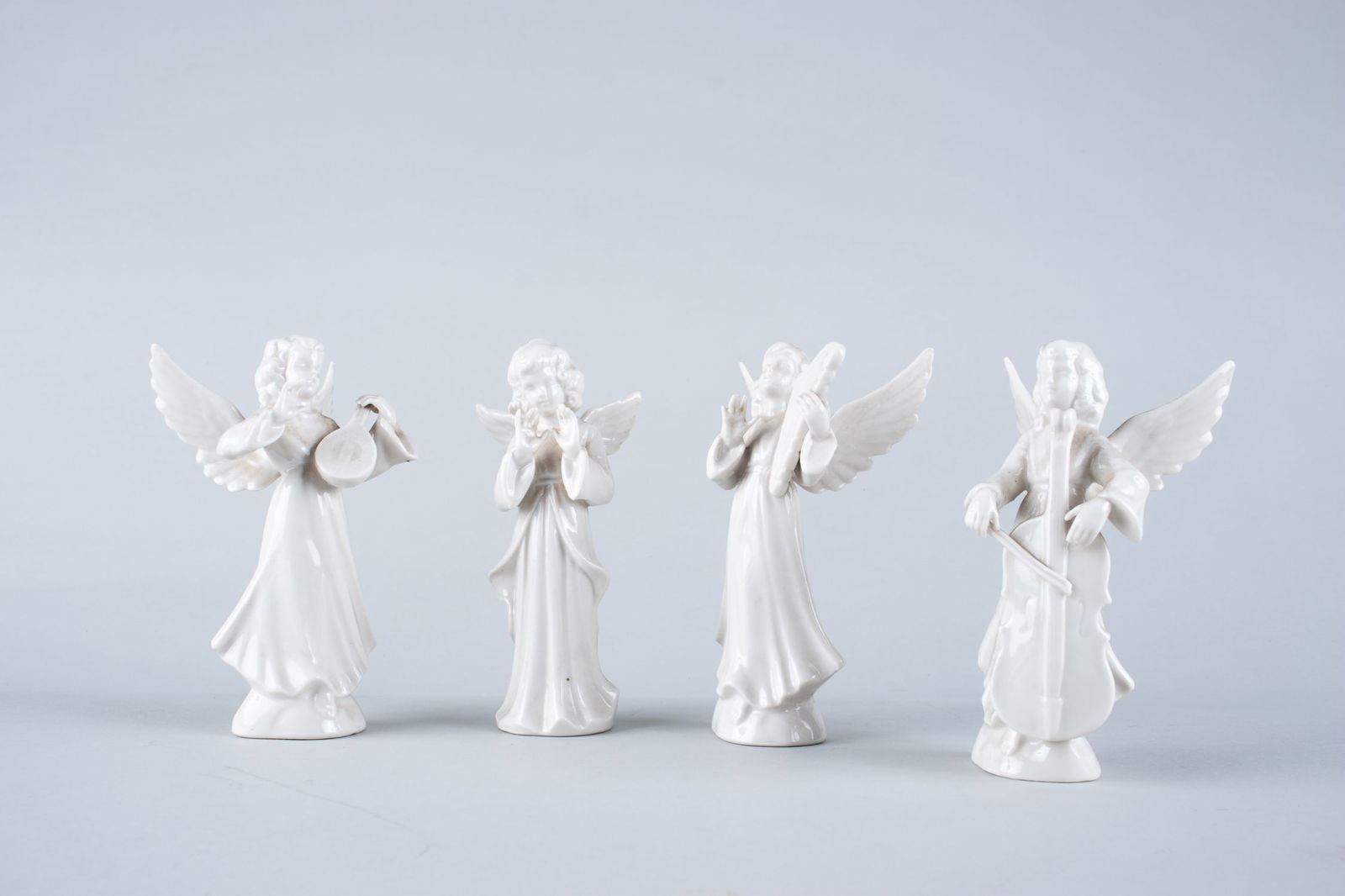 4 PORCELAIN ANGELS (1 of 1)