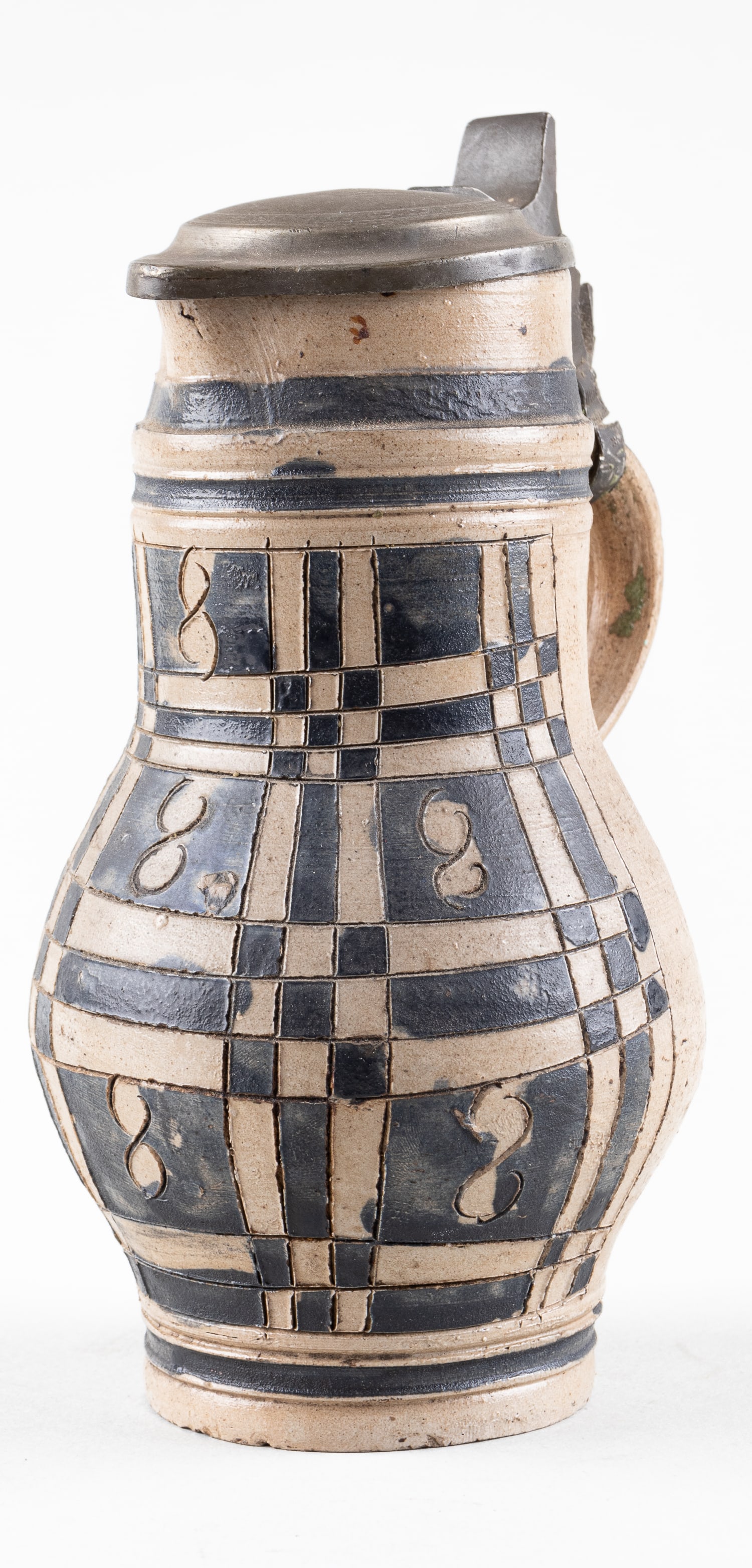 VINTAGE GERMAN 'BEMBEL' WINE CARAFE: Vintage German 'Bembel' wine carafe or decanter with a pewter lid engraved 'WH'. The pewter ring around the handle has a small tear, making the lid loose. Traditional blue pattern. 7.5 inches tall