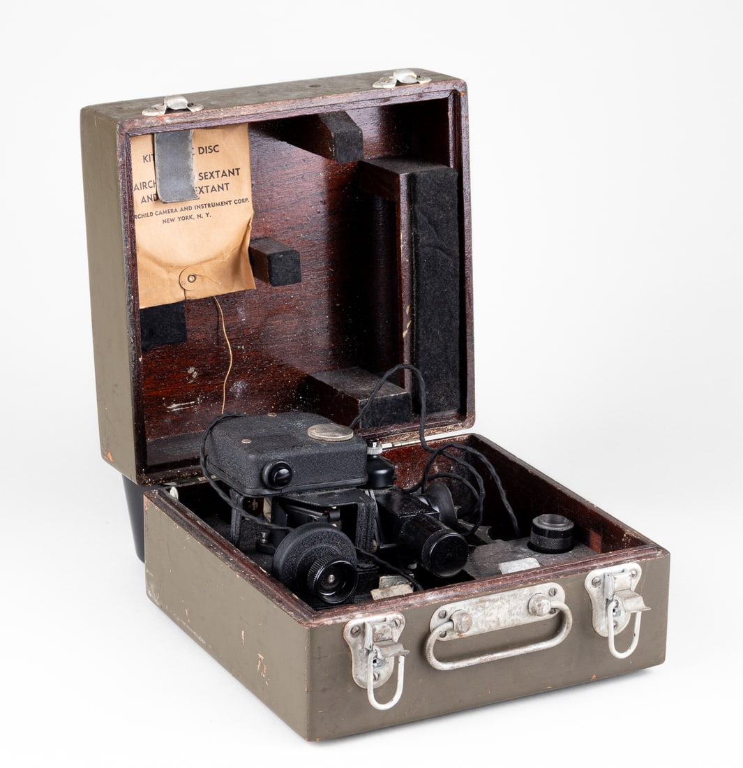 AMERICAN WWII A-10A AIRCRAFT SEXTANT: An American WWII aircraft sextant model A-10A manufactured by Fairchild Camera Instrument Corporation. The sextant was made primarily for light aircraft use. Included is a wooden carrying case with a 