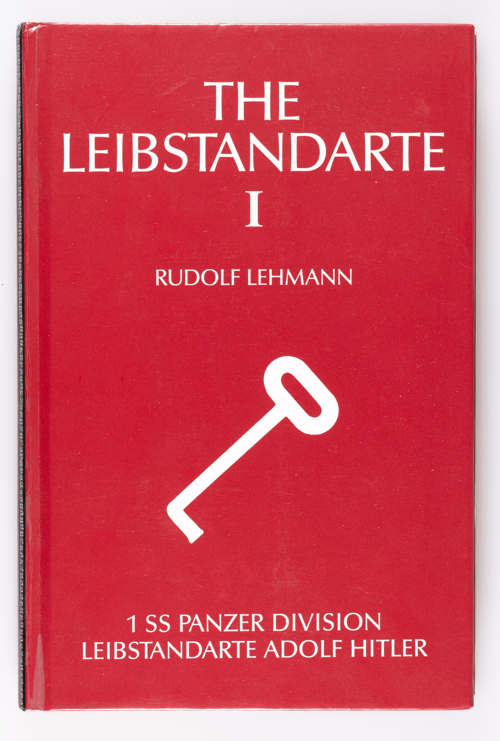 THE LEIBSTANDARTE: The Leibstandarte, Volume I, by Rudolf Lehmann, translated by Nick Olcott, 1987. Red hardcover book with black spine, 314 pages, 9.25 x 6.25 inches. Some minor wear to the spine.