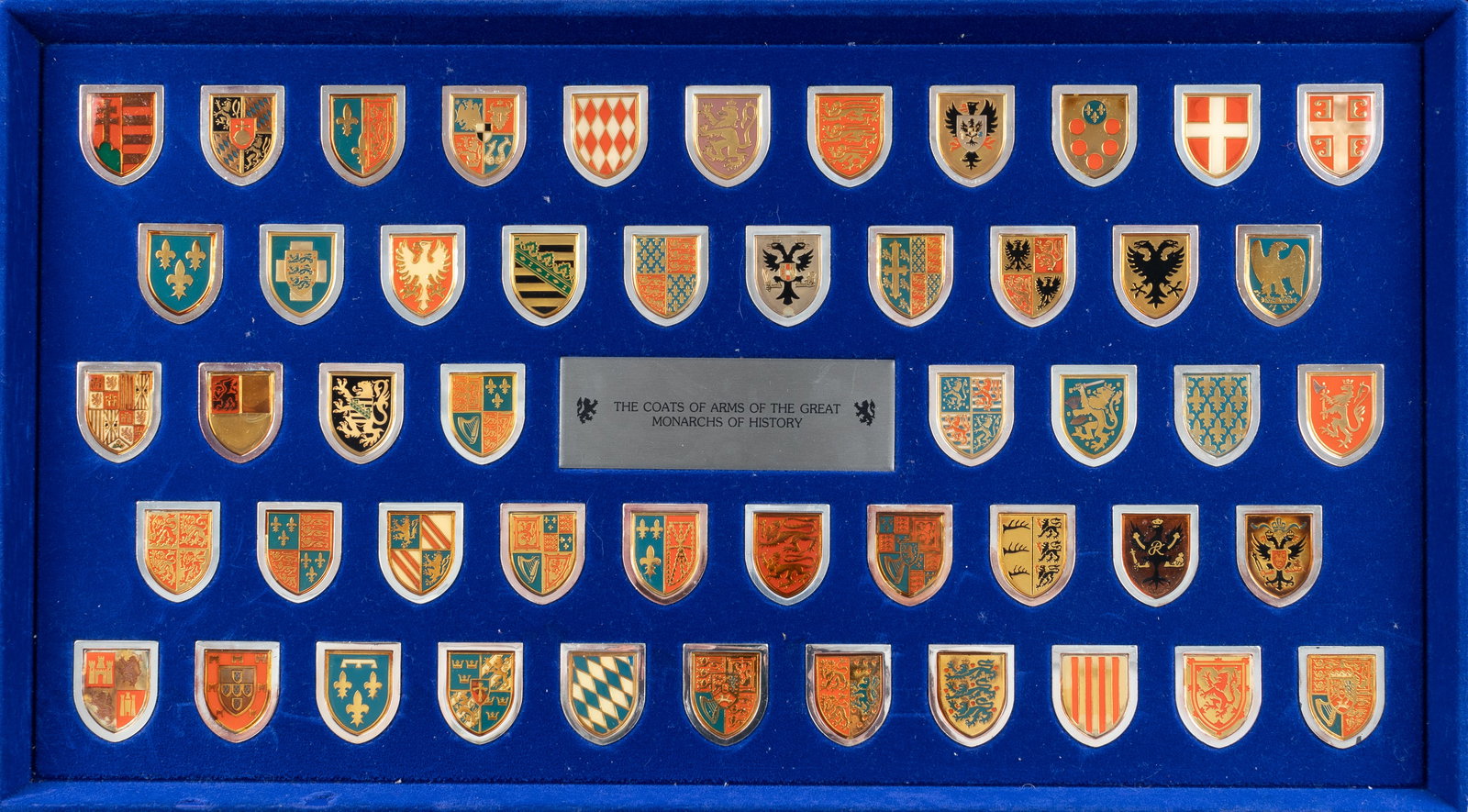 COAT OF ARMS GREAT MONARCHS OF HISTORY: Coat of Arms of the Great Monarchs of History made of sterling silver and 24kt gold by the Franklin Mint. Includes full set of 50 hand-enameled shields, 670 grams of sterling silver and 24kt gold. Inc
