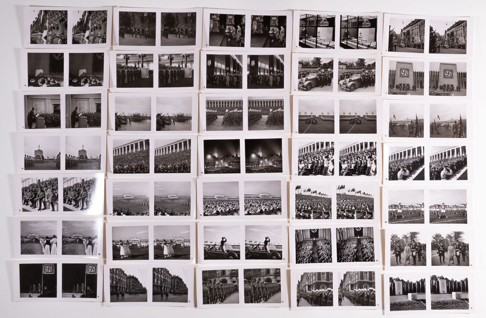 PARTEITAG GROSSDEUTSCHLANDS WWII STEREOCARD SET: Complete set of stereocards from the WWII German Parteitag Grossdeutschlands Raumblid-Verlag, 1939, with 11 Raumbild-Aufnahmen by Heinrich Hoffman. 5.25 x 2.25 inches for each card. Photos in excellen