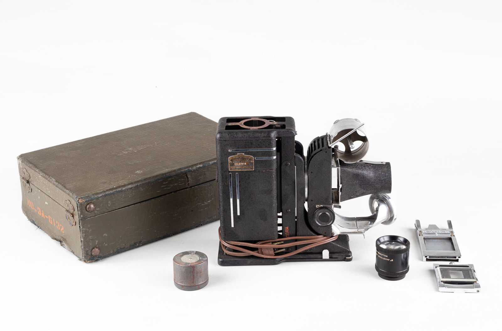 US TRI-PURPOSE SVE PROJECTOR MODEL AAA: American Tri-purpose SVE projector model AAA 1940's 120 volt 300 watts. The projector is housed in the original wood carrying case, and includes a slide cover and a 2-slide changer. Functionality is u