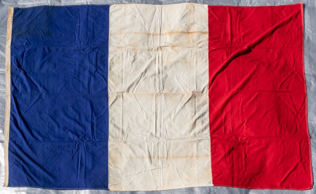 FRENCH NAVAL FLAG: American made double-sided French Naval flag, undated, stamped '5 x 8 FT France' on the hoist. 91 x 57 inches.