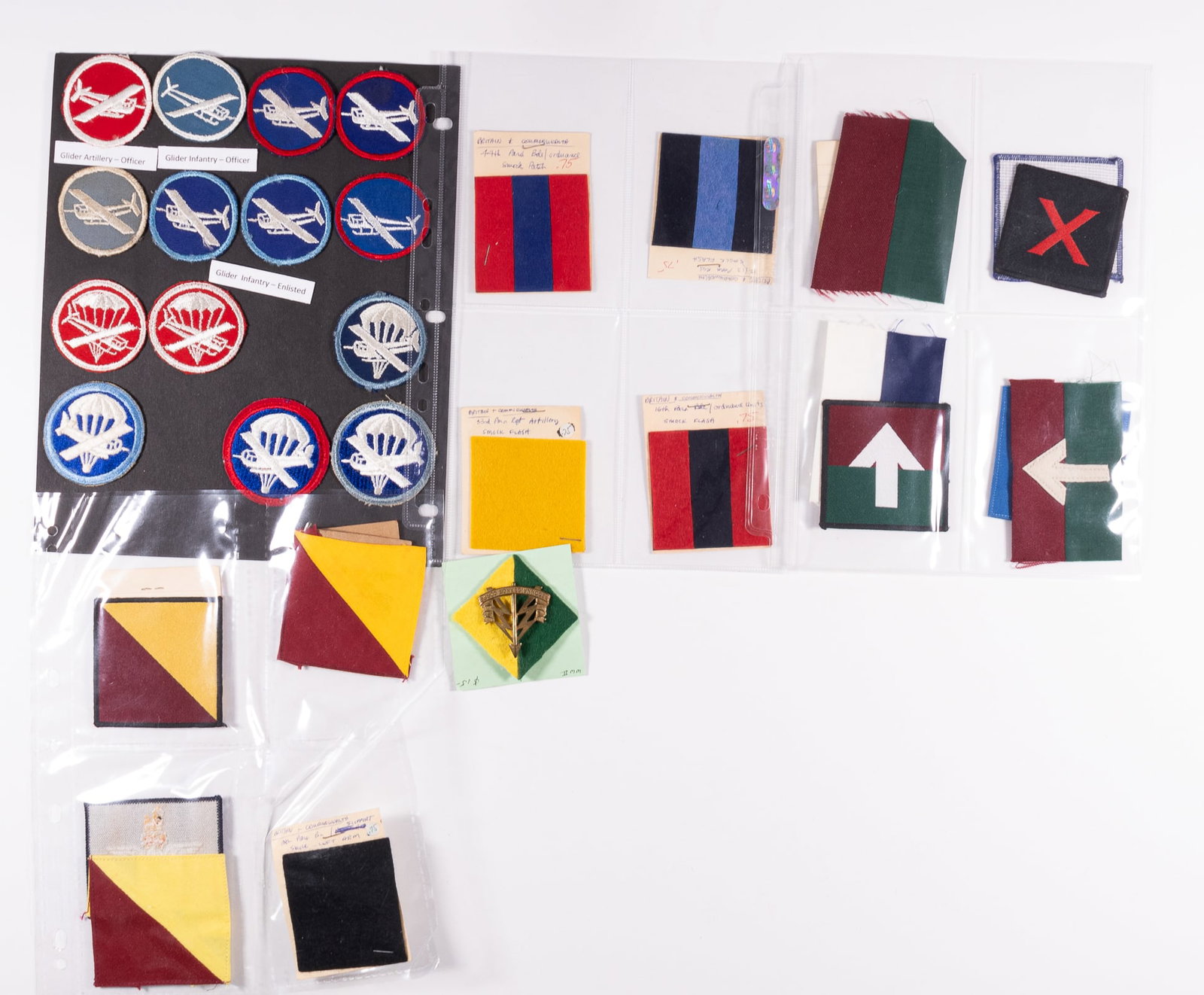 44 BRITISH AND AMERICAN PARACHUTIST PATCHES: 44 American with British and Commonwealth Parachutist patches, featuring; 1) World War II Reconnaissance Corps badge on patch. 2) eight WWII Glider Infantry and Artillery Officer patches. 3) six WWII 