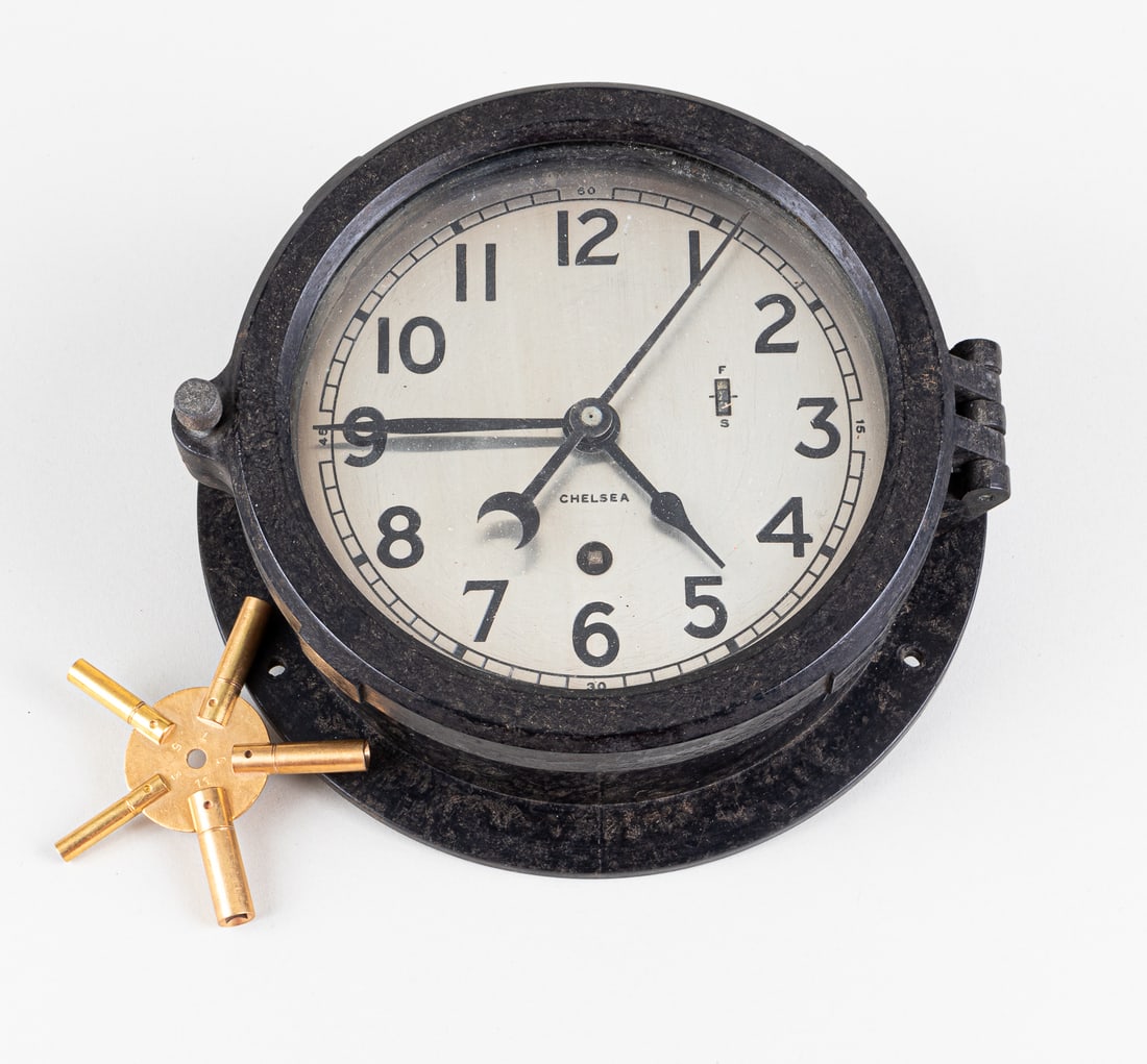 CHELSEA BAKELITE US NAUTICAL SHIP CLOCK: Bakelite US Nautical ship clock by the Chelsea Clock Company, Boston, for use on US Naval ships and were used beginning in WWII. The dial has a Fast and Slow setting. Includes a modern brass key, and