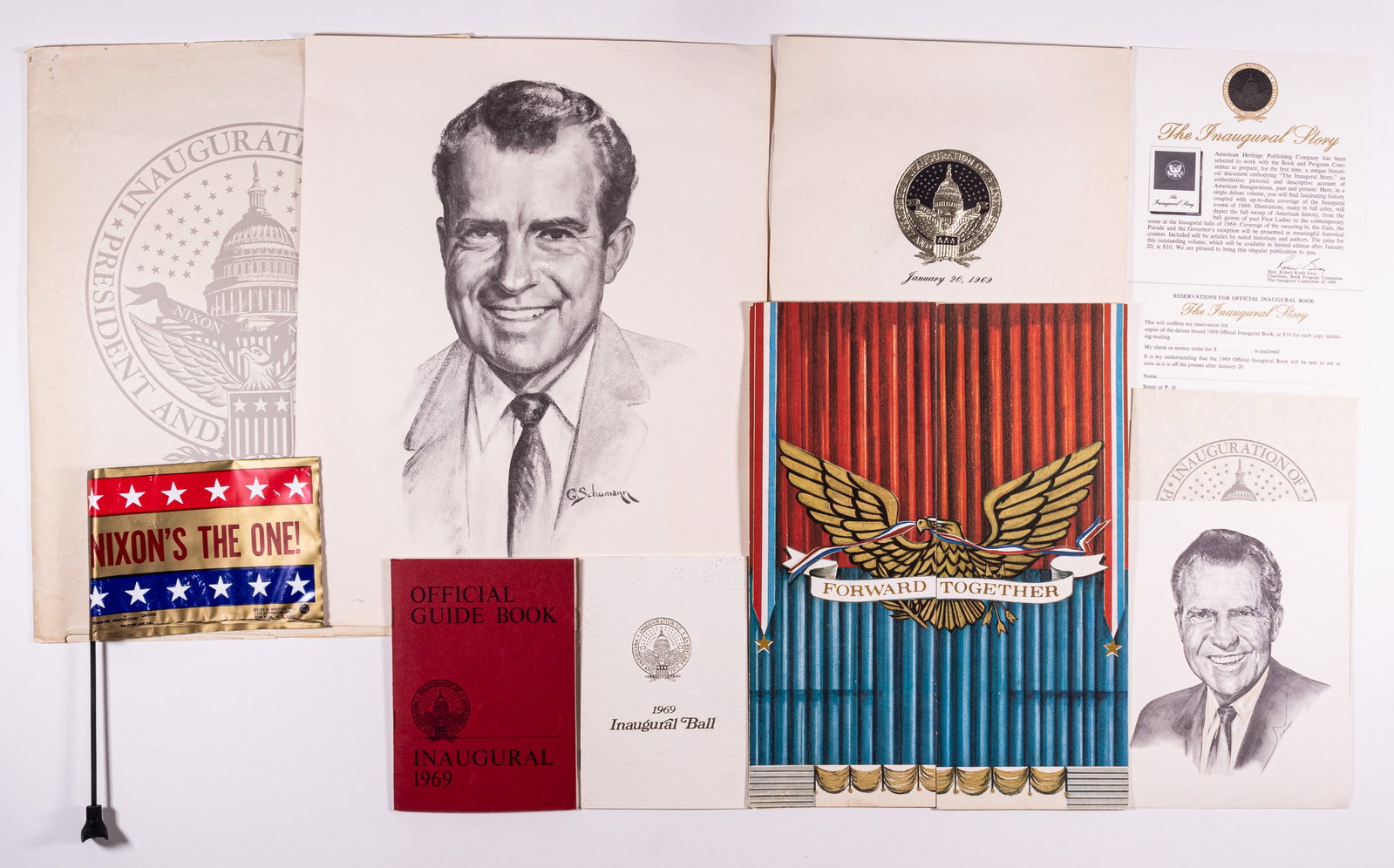 RICHARD NIXON 1969 INAUGURATION EPHEMERA: Including the official inaugural program, 11 x 8.5 inches; 'NIXON'S THE ONE!' plastic flag from Felley & Wheeler Inc.; two b/w portrait prints of Nixon, one 7.5 x 5.5 inches and one 14.5 x 11.25 inche