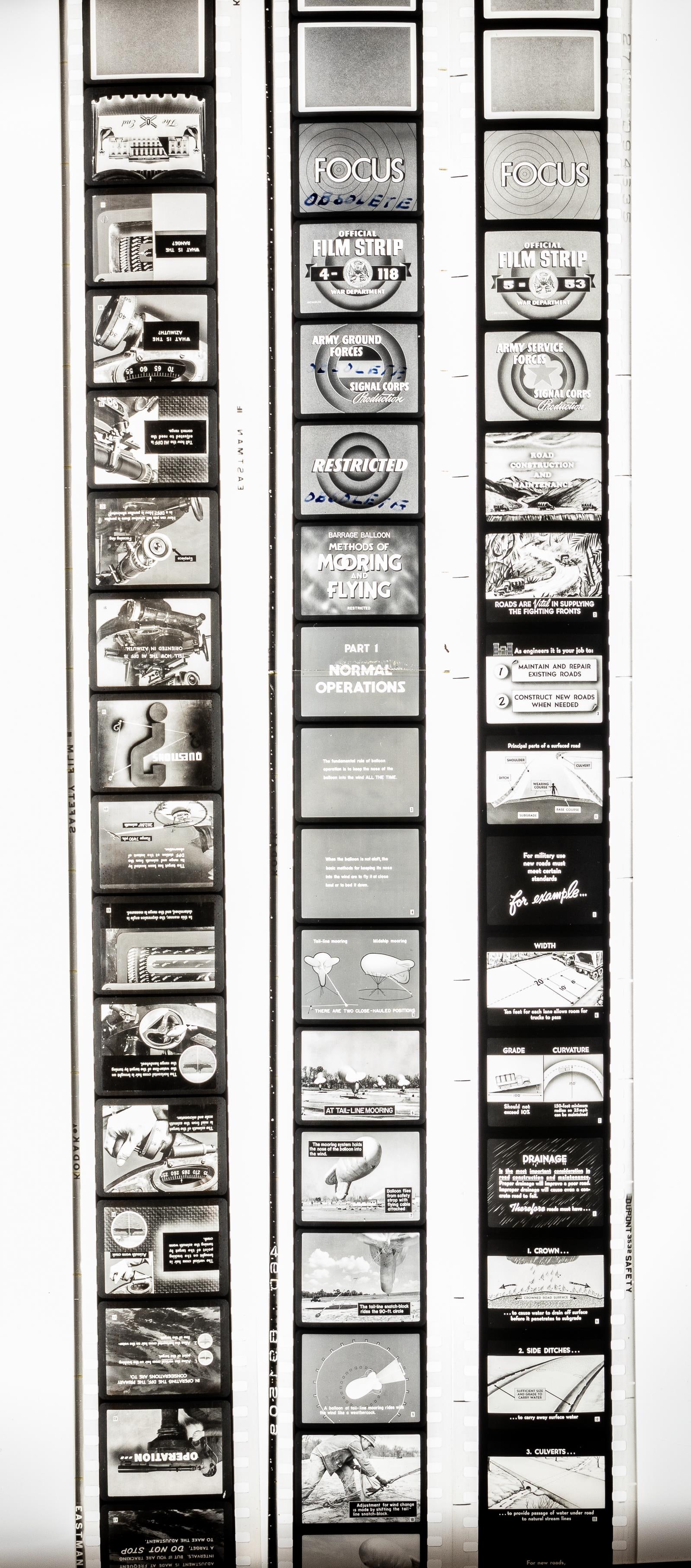 3x SIGNAL CORPS 35MM TRAINING FILMS: Lot of three WWII US Signal Corps official training slideshows, including 'Road Construction and Maintenance' official film strip 5-53 by the War Department, 64 slide slideshow detailing the way the A
