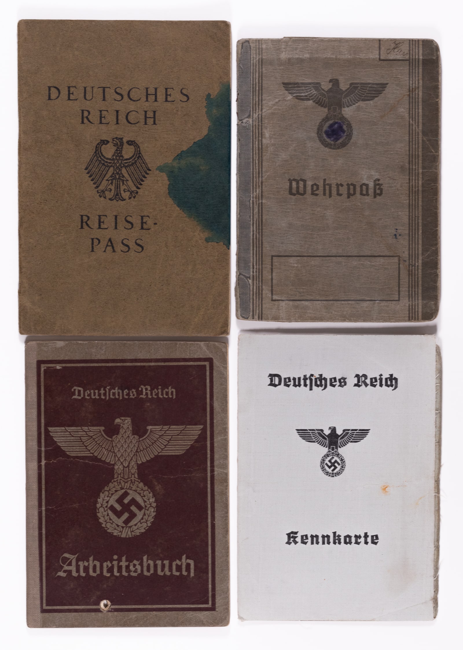 FATHER AND SON WWII GERMAN IDS: WWII German father and son's German IDs, the father is named Georg Gustav Hauss, includes his Kennkarte ID pass with ID photo and fingerprints, and his fishing license. The son is named Eugen Hauss an