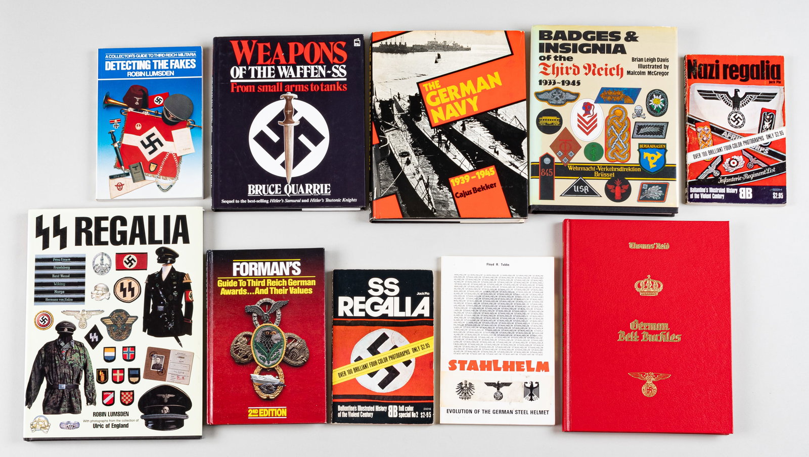 10 THIRD REICH REFERENCE BOOKS: Lot of ten Third Reich reference books including three SS reference books, German uniform books, weapon books, along with badge and medal books. Each book is written in English and most of the books i