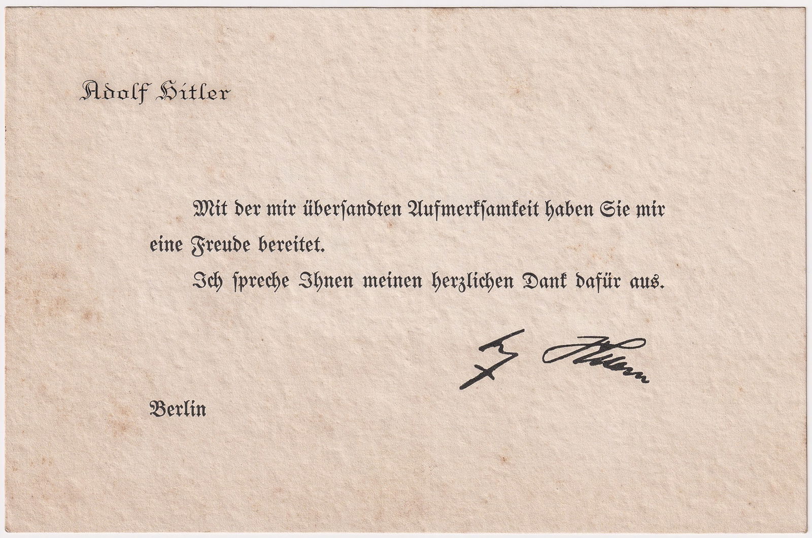 ADOLF HITLER THANK YOU CARD: Adolf Hitler's personal thank you card with a printed signature in the bottom right, reads 'You have given me joy with the attention you have sent to me. I would like to express my sincerest thanks to