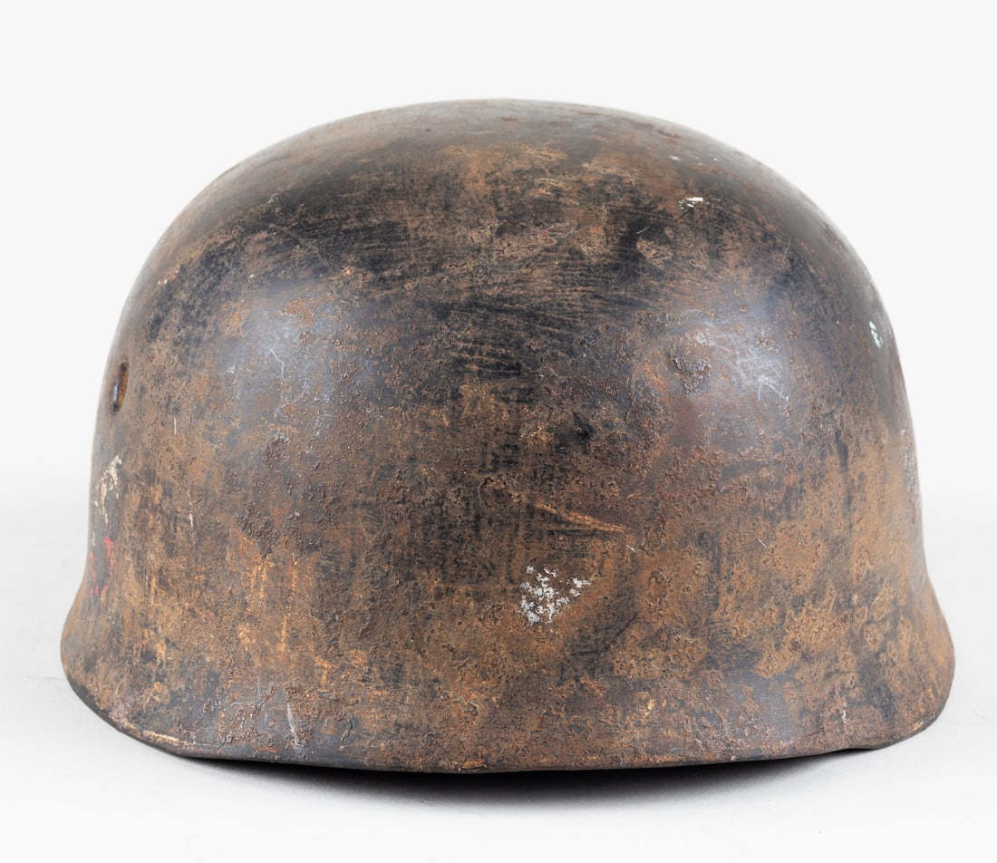 WWII GERMAN M38 PARATROOPER HELMET SHELL: WWII German M38 paratrooper helmet shell without liner, remnants of decals on the left and right of the helmet, heavy oxidation throughout the helmet. With four helmet bolts for the M38 helmet, each b