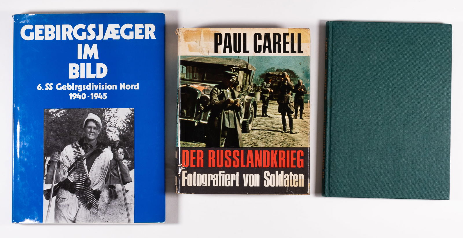 THREE GERMAN WWII HISTORY BOOKS: Lot of three WWII German military history reference books including 'Gebirgsjaeger im Bild 6. SS Gebirgsdivision Nord 1940-1945' by Alfred Steurich, 1972, 11.75 x 8.5 inches, 200 pages; 'Die Grosse Of
