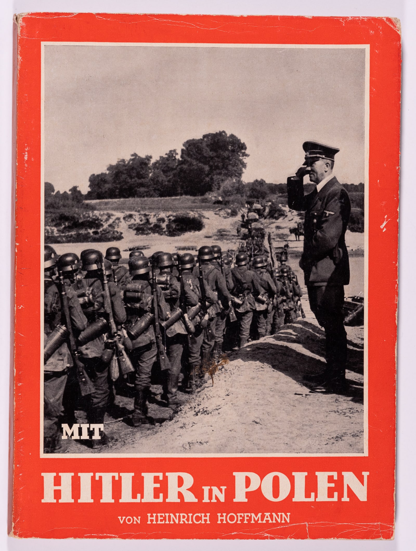HITLER IN POLAND - HITLER IN POLEN: 'With Hitler in Poland' WWII German photo book by Heinrich Hoffman, 1939. Soft cover book with original dust jacket, minor chips, over 100 b/w photos, 92 pages, 10.5 x 7.5 inches.