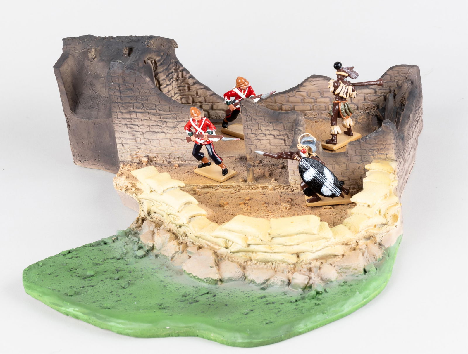 BRITAIN'S RORKE'S DRIFT HOSPITAL #00143: Britain's Limited Edition Zulu War diorama set #00143 Rorke's Drift Hospital with the large hospital battleground diorama, two British soldiers, and two Zulu soldiers. In very good condition. With the