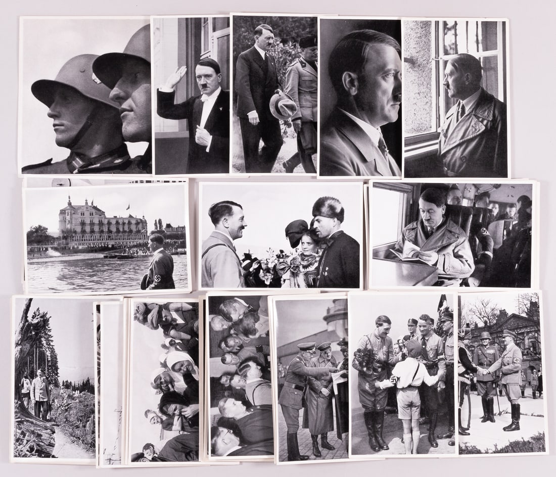 ADOLF HITLER CIGARETTE CARDS (92): Lot of ninety-two Adolf Hitler cigarette cards, ninety from the 'Adolf Hitler' cigarette card set, most including a b/w picture of Hitler, 3 1/8 x 4.75 inches each, also includes two cards from the 'F