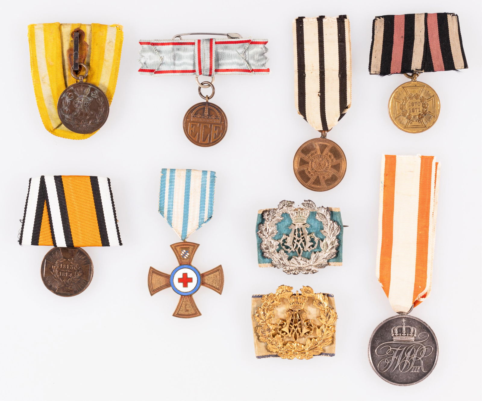 WWI IMPERIAL GERMAN MEDALS: Lot of nine WWI Imperial German medals, including the WWI Commemorative Medal, the Prussian General Honor Decoration in silver, the 1813-1814 Commemorative War Medal, the Konigreich Sachsen Friedrich