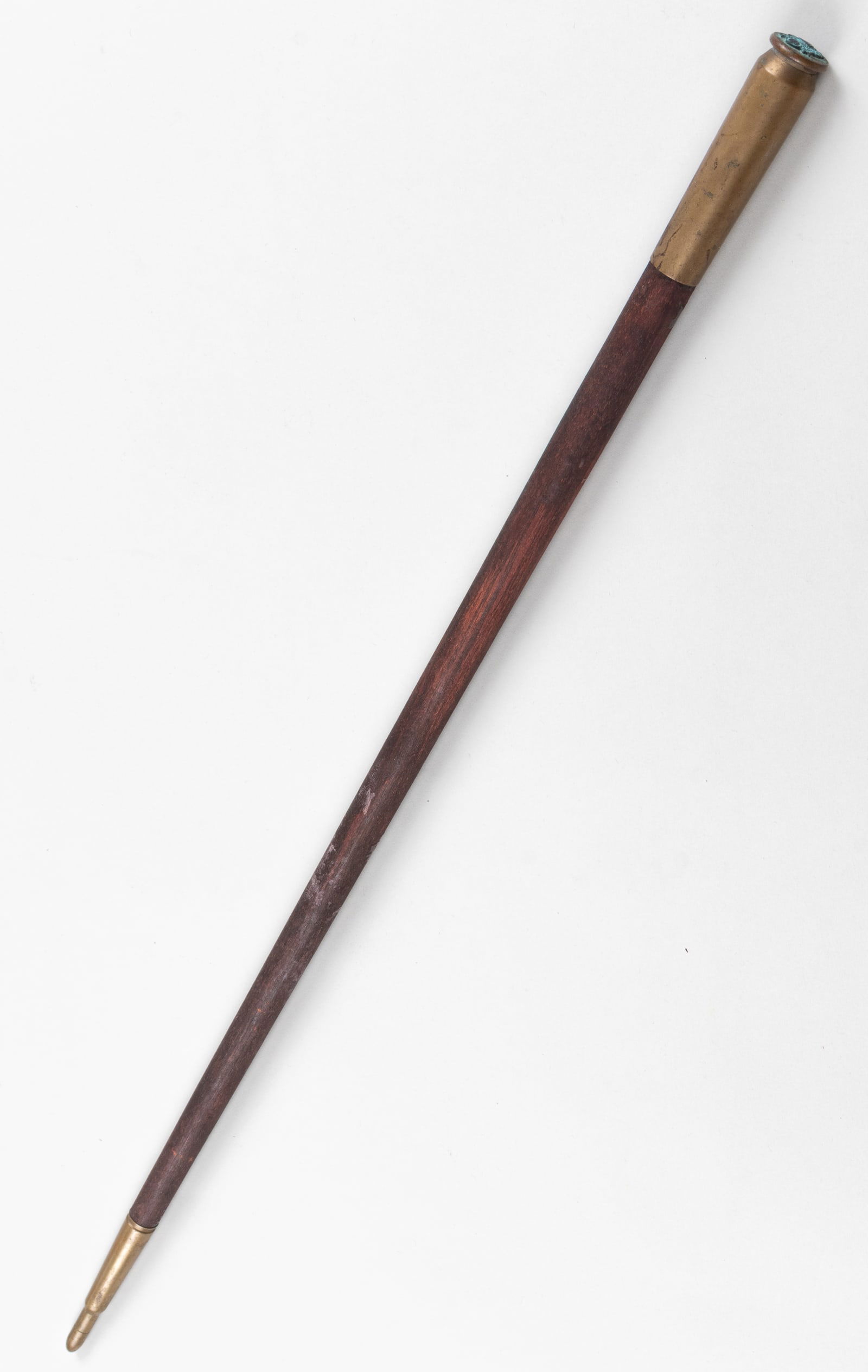 WWII AMERICAN ARMY SWAGGER STICK: WWII American Army wooden swagger stick, brass top handle with the US Army eagle insignia at the top, a wooden shaft, and a brass bullet tip. 23.75 inches.