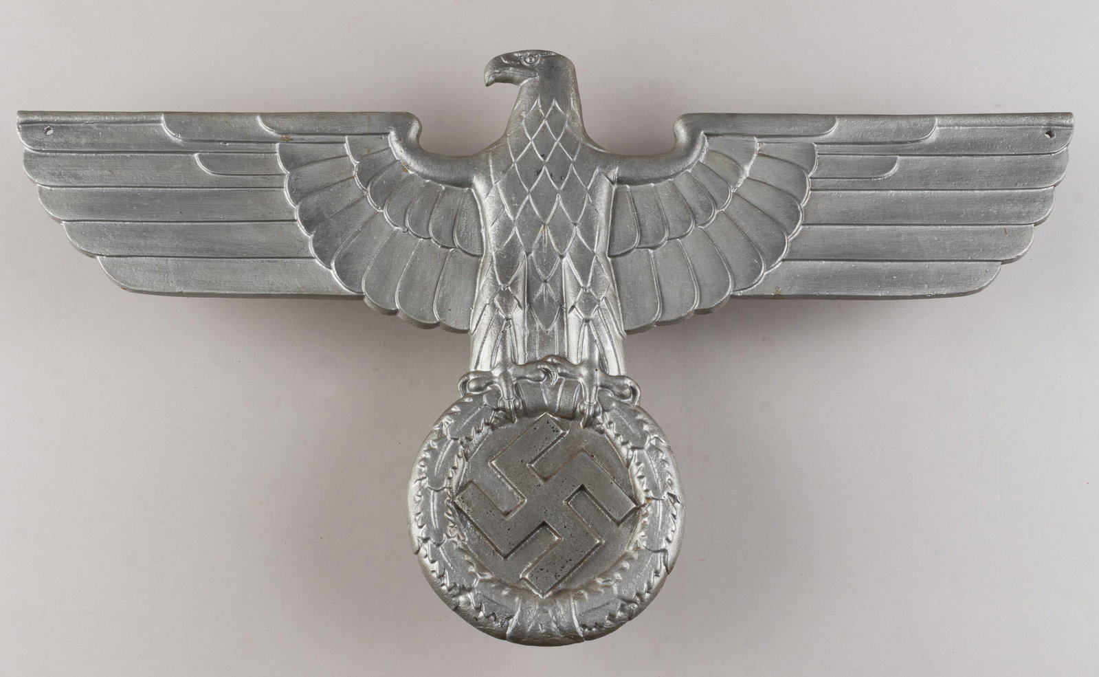 GERMAN EAGLE: Aluminum cast eagle, measuring approx. 23.75 x 15.25 inches. Two holes drilled into the wings for mounting. Display piece.