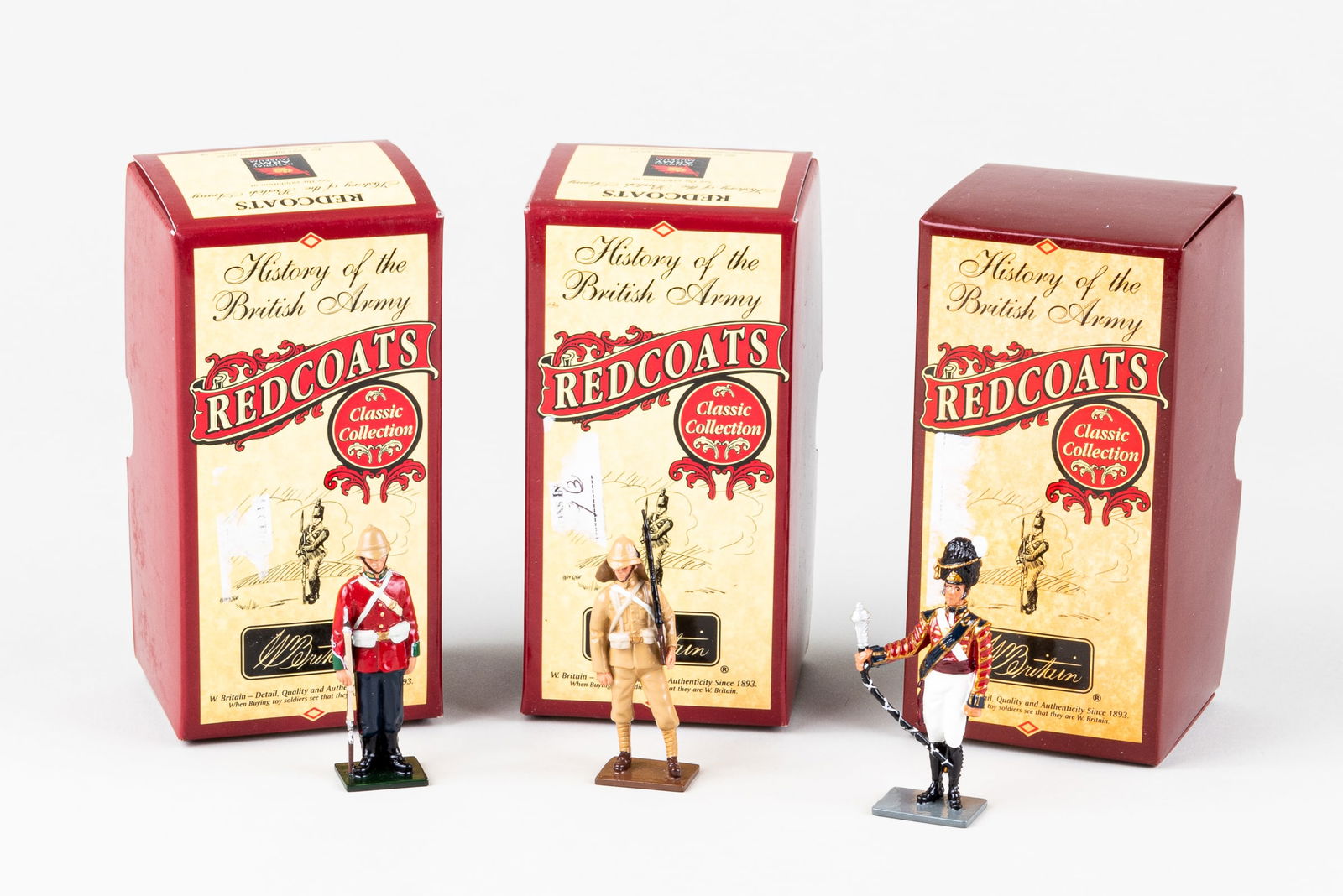 BRITAINS TOY SOLDIER REDCOATS SETS (3): Three sets of William Britain's History of the British Army Redcoats series. Includes set 43137 British Private, 24th Regiment of Foot, 1879, 44006 Guardsman, Grenadier Guards, 1898, and 44028 Drum Ma