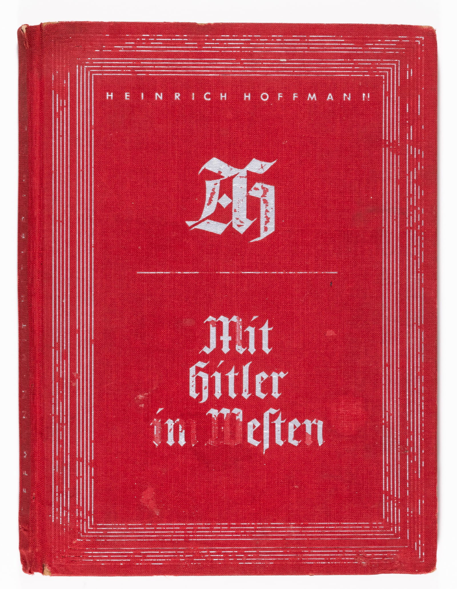 MIT HITLER IM WESTEN RARE HARDCOVER HOFFMANN PHOTOBOOK: 'With Hitler in the West' rare hardcover edition of the WWII German Heinrich Hoffmann photobook, with a foreword by Generalfeldmarschall Keitel, published in 1940. Red hardcover cloth book with silver