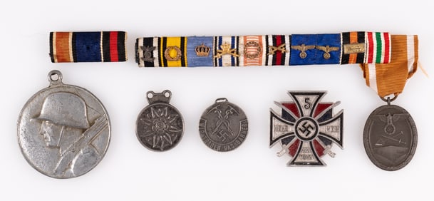 7 WWII GERMAN MEDALS AND BADGES