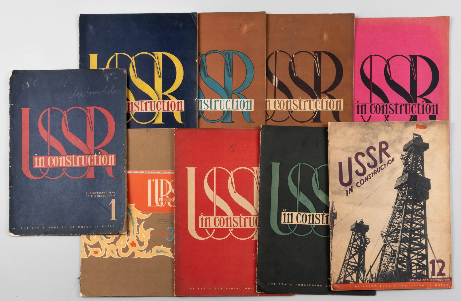 USSR IN CONSTRUCTION SOVIET PROPAGANDA MAGAZINES (9): Lot of nine 'USSR In Construction' Soviet propaganda magazines, three issues from 1933, including issue 1, the cover is loose with tears around the margins, issue 8, and issue 11; two from 1932, inclu