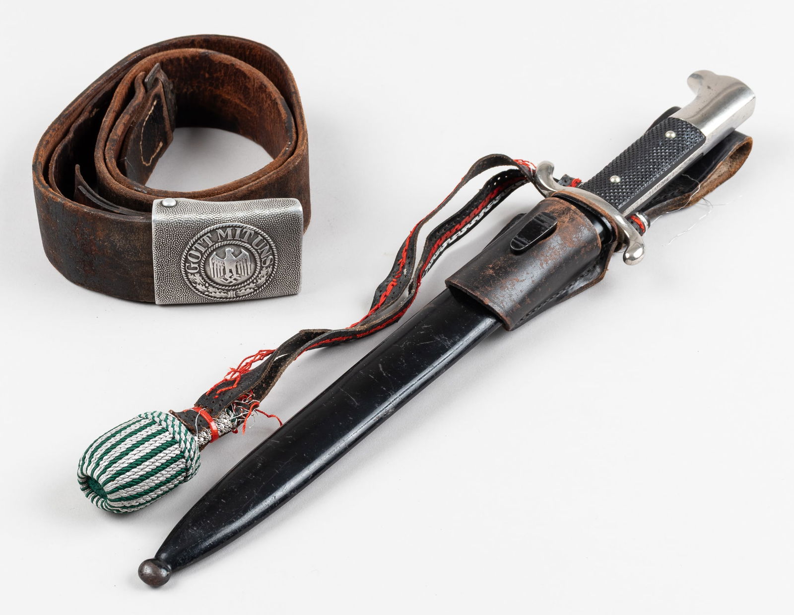 WWII GERMAN FIREMAN DAGGER WITH PORTEPEE AND BELT W/ ARMY BUCKLE: WWII German Fireman's dress dagger with scabbard, leather frog, and portepee, marked on the ricasso J.A. Henckels, Solingen, some scratching to the blade, portepee strap separating, most of the silver