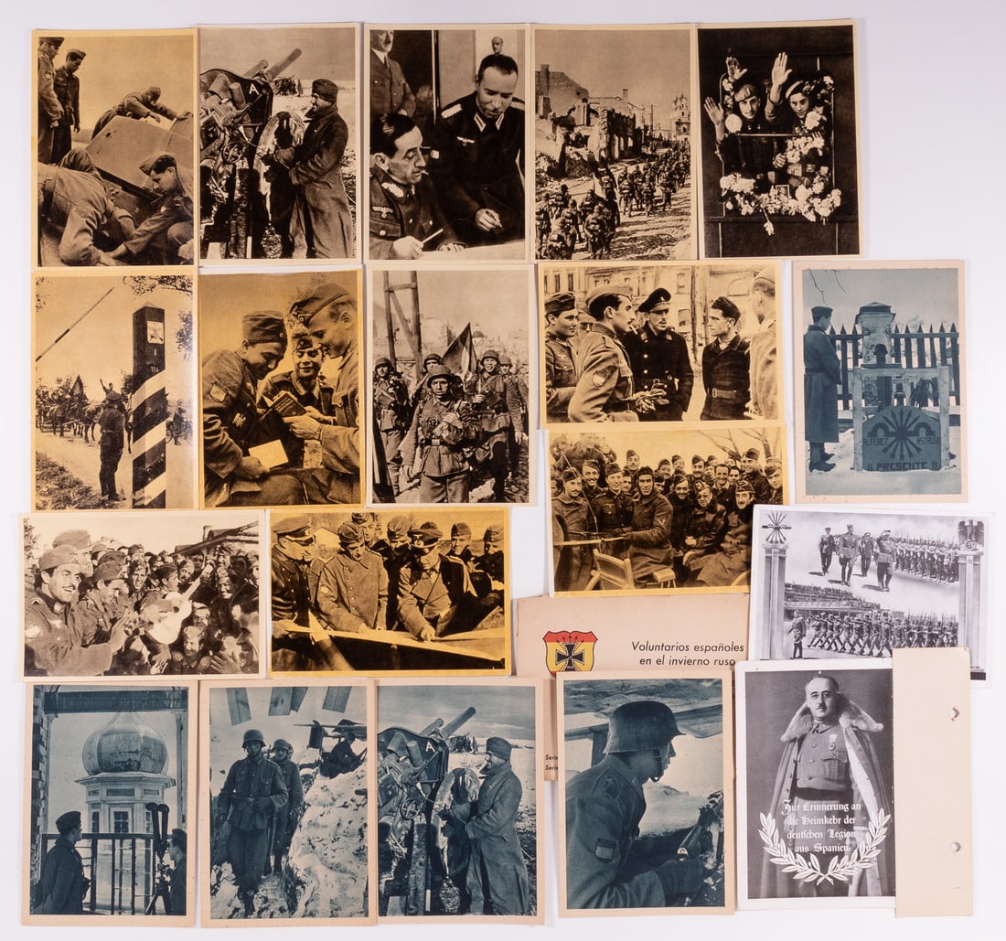 19 WWII SPANISH VOLUNTEER LEGION PHOTOS: 19 Spanish Volunteer Legion, also known as the Blue Legion. Photos include Spanish Legion members marching with their standard somewhat visible, one of a soldier's sleeve insignia emblem on display, m