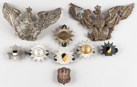 9 GERMAN HELMET EAGLES AND CAP BADGES