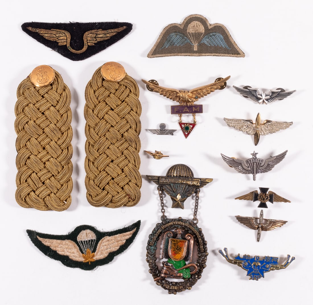 INTERNATIONAL PILOT AND PARACHUTIST WING BADGES AND PATCHES: Thirteen international pilot and parachutist wing badges and patches from countries around the world. Including a Mexican Air Force jump wings badge, two USAAF sweetheart wings badges, one marked 'Tri