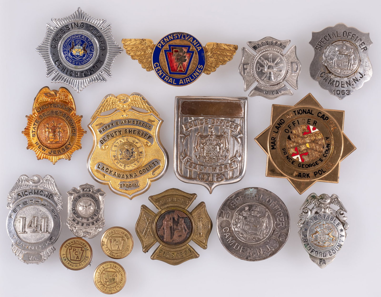 13 OBSOLETE US EAST COAST SERVICES BADGES: Thirteen obsolete US East Coast services badges, with police, fire department, and other services badges. Including two Camden, N.J. Special Officer badges, a New Jersey State Secret Service badge, a 