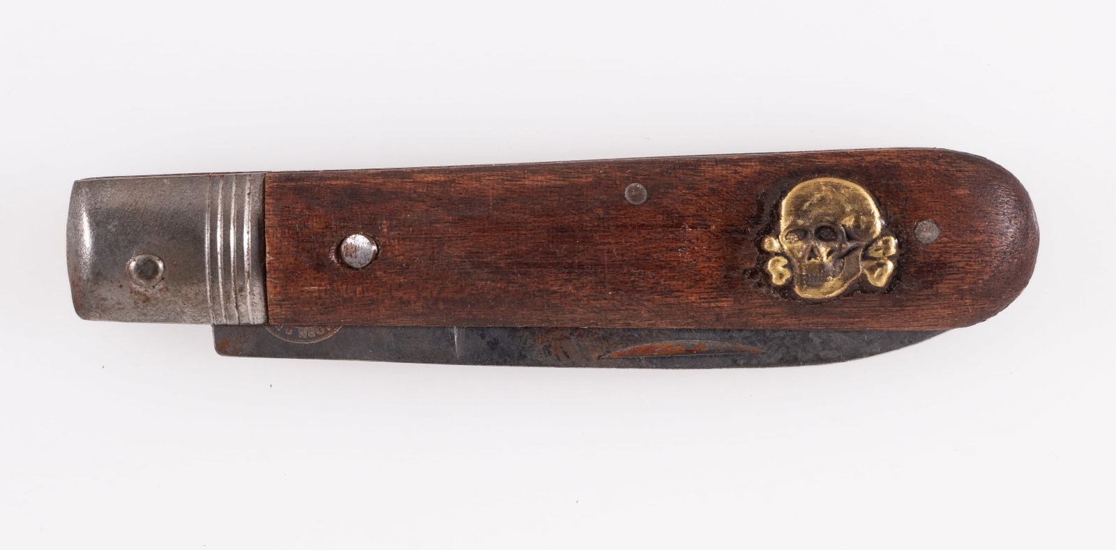 TOTENKOPF POCKET KNIFE: Totenkopf pocket knife, blade is marked 'Carl Eickhorn Solingen' and 'RZM M7/66' on the ricasso of the blade. Wood grips with gold colored Totenkopf insignia on one end of the grip. 3.5-inch long blad